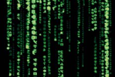 Bildschirmschoner mit grünen Symbolen auf schwarzem Grund im Stil der Filme der "Matrix"-Reihe